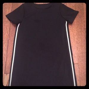 Black, short sleeved black dress.